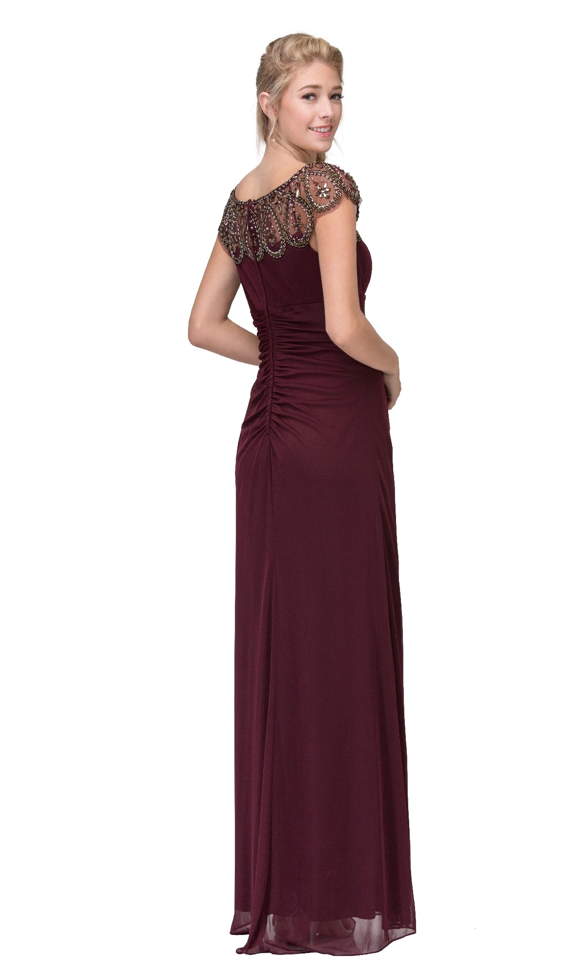 A woman models the Cap-Sleeve Long Formal Dress: Eureka 3927, featuring intricate beadwork on the shoulders and back, as she stands and looks over her shoulder against a white background.
